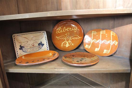 Appraisal: FIVE TURTLE CREEK REDWARE DISHES Redware dishes in various sizes