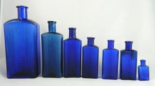 Appraisal: cobalt poison bottles Poison- cobalt rectangular all embossed on front