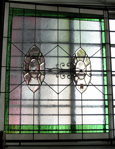 Appraisal: AN AMERICAN HAND CRAFTED STAINED AND LEADED GLASS WINDOW PANEL