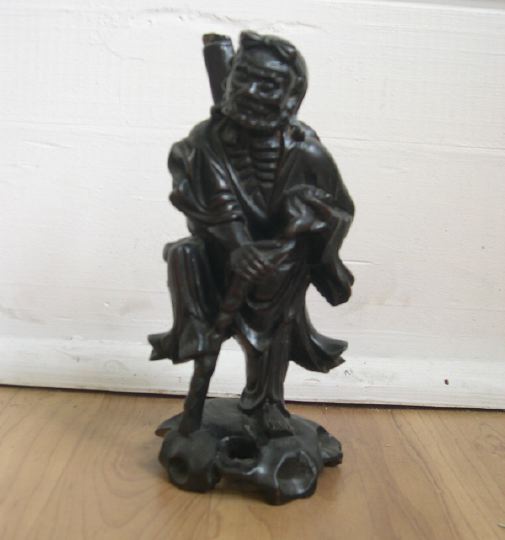 Appraisal: Diminutive Kuang Hsu Carved Hardwood Figure depicting an emaciated Immortal