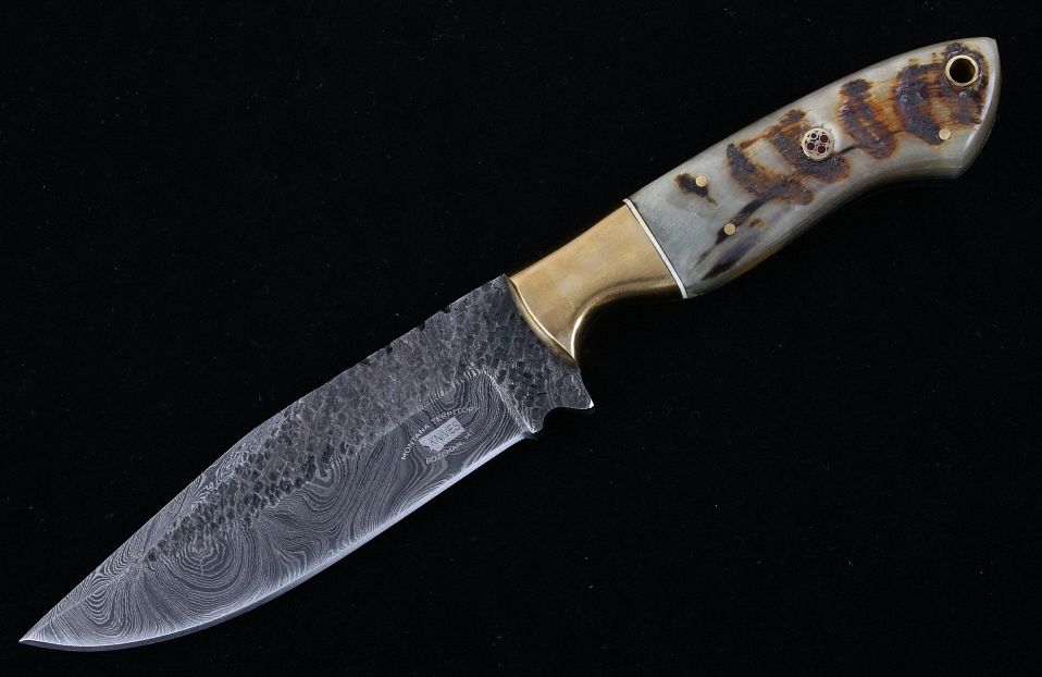 Appraisal: M T Knives Rams Horn Damascus Hammered Knife This is