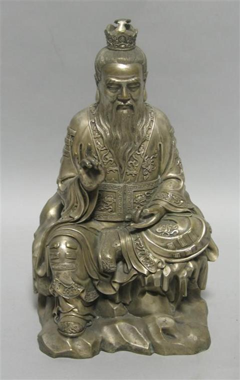 Appraisal: CHINESE SILVERED METAL FIGURE OF A SEATED DIGNITARY The bearded