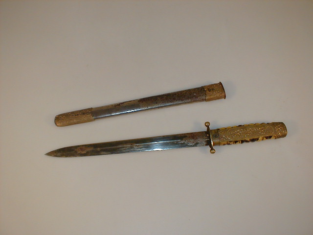 Appraisal: A short sword or dagger with faux tortoiseshell handle overlaid