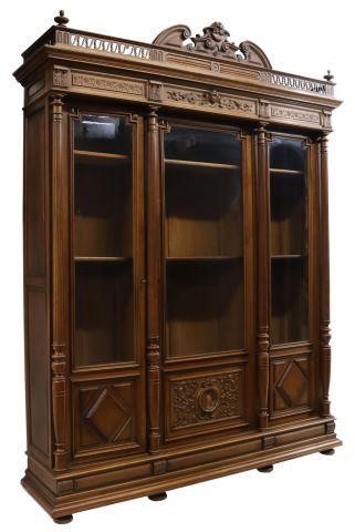 Appraisal: French Henri II style walnut bookcase late th c carved