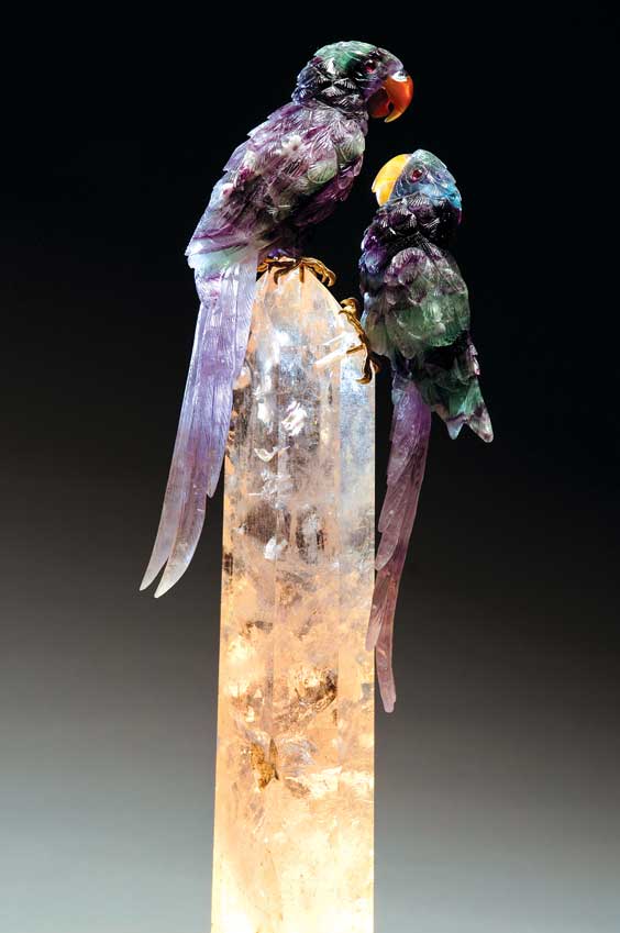 Appraisal: FLUORITE MACAWS ON A CRYSTAL GRANITE LIGHTED BASE Artist Peter