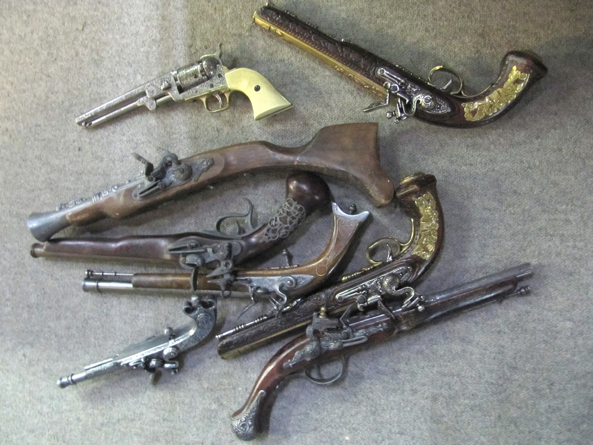 Appraisal: A collection of th century replica flintlock pistols muskets etc