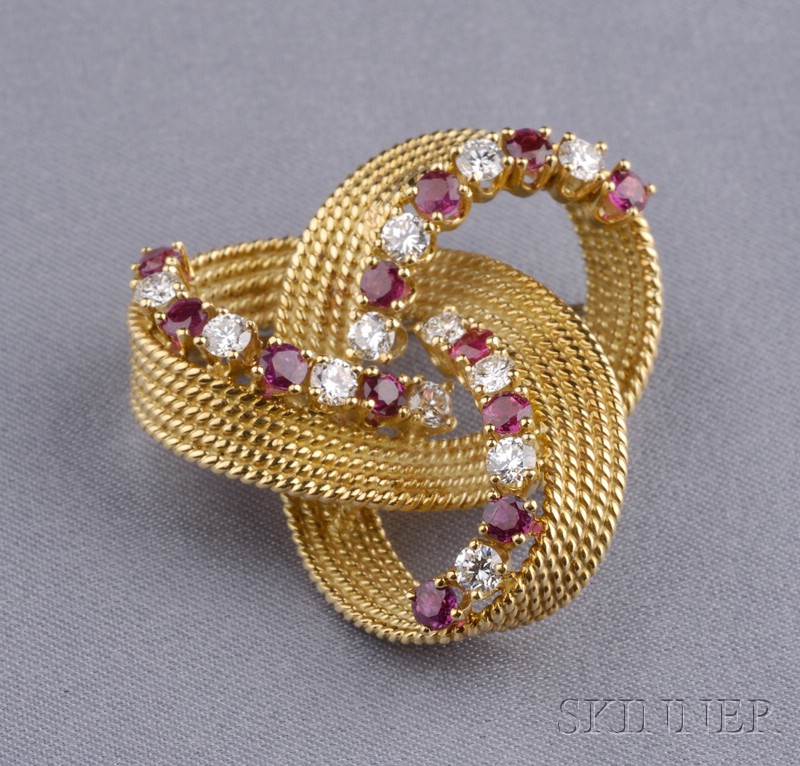 Appraisal: kt Gold Ruby and Diamond Knot Brooch prong-set with full-cut