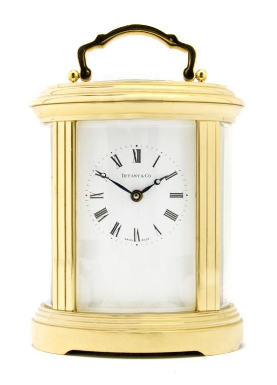 Appraisal: Brass and Beveled Glass Carriage Clock retailed by Tiffany and