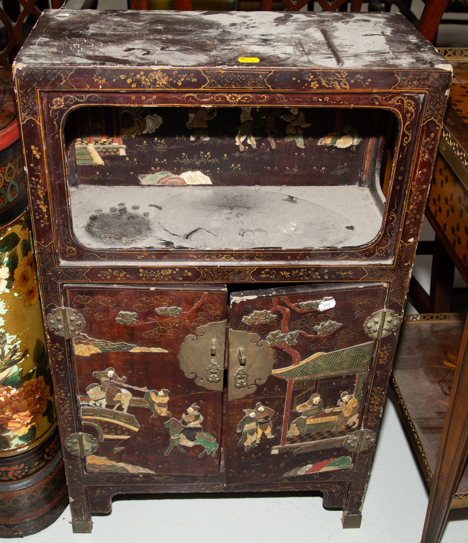 Appraisal: CHINESE LACQUERED DISPLAY CABINET Early th century with colored stone