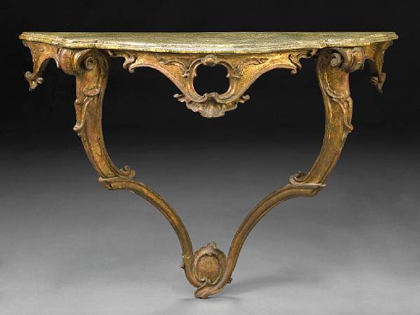 Appraisal: An Italian Rococo paint decorated and giltwood console table th