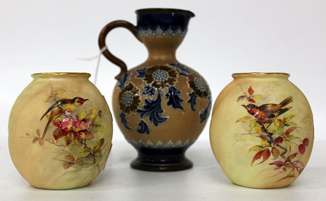 Appraisal: A PAIR OF ROYAL CHINAWORKS WORCESTER VASES hand painted bird