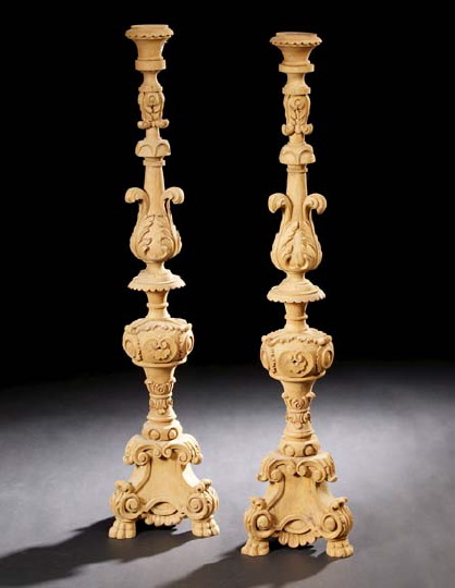 Appraisal: Monumental Pair of Italian Carved Pine Pricket Candlesticks in the