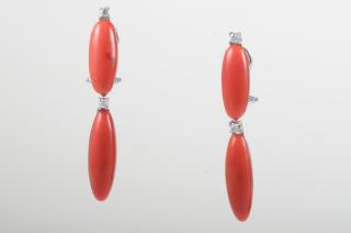 Appraisal: Coral Drop Earrings Four long oval shape coral drop earrings