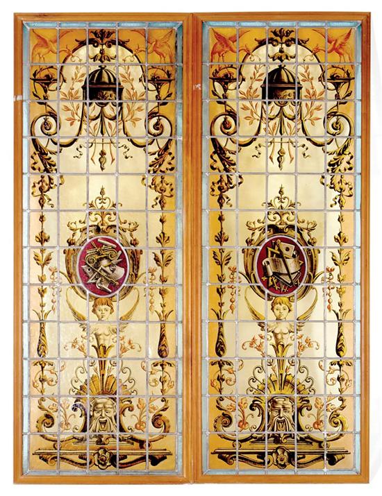 Appraisal: Two English stained and paint-decorated glass panels rectangular form with