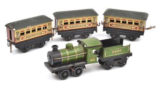 Appraisal: HORNBY GAUGE CLOCKWORK LOCO TENDER AND THREE PULLMAN CARRIAGES UNBOXED