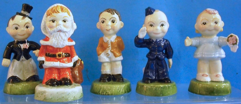 Appraisal: Carltonware Figures Groom Schoolboy Bride Santa and Airman limited edition