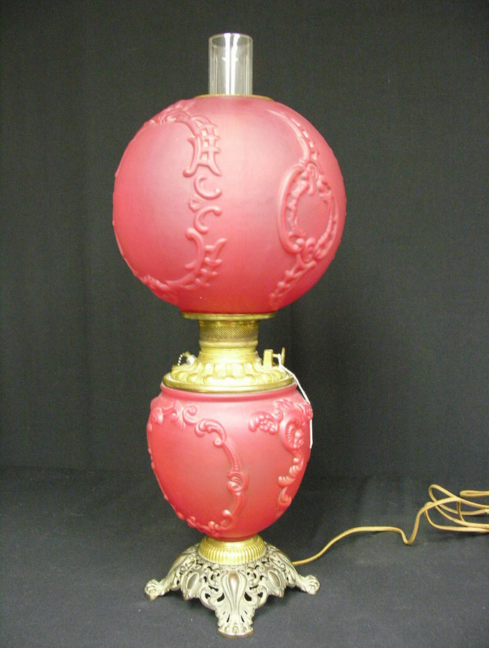 Appraisal: VICTORIAN RED SATIN GLASS G W T W LAMP Electrified