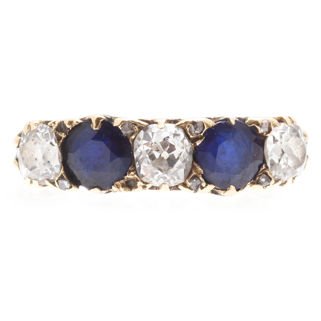 Appraisal: A sapphire and diamond set five stone ring claw set