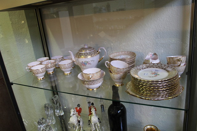 Appraisal: A TUSCAN PINK GROUND TEA SET each having a gilt