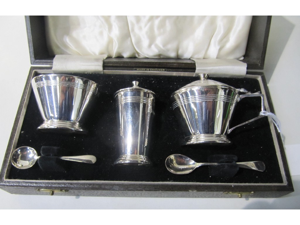 Appraisal: Cased three piece Art Deco style silver condiment set Birmingham