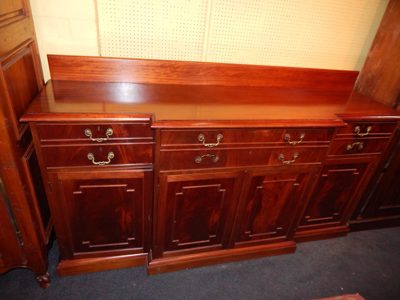 Appraisal: A thC mahogany breakfront sideboard the top of the raised