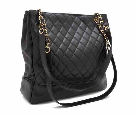 Appraisal: A Chanel Black Leather Shopper Tote with chainlink and leather