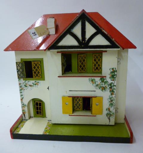 Appraisal: A mid late th century doll's house painted wood construction