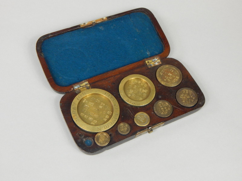 Appraisal: A set of brass scales and weights stamped City of