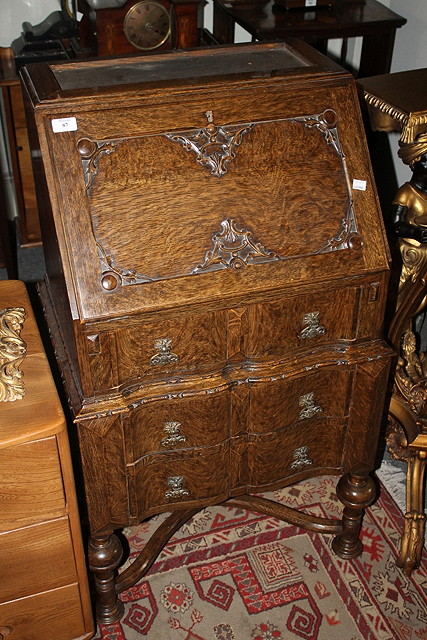 Appraisal: AN OAK SMALL BUREAU BOOKCASE the fall front opening to