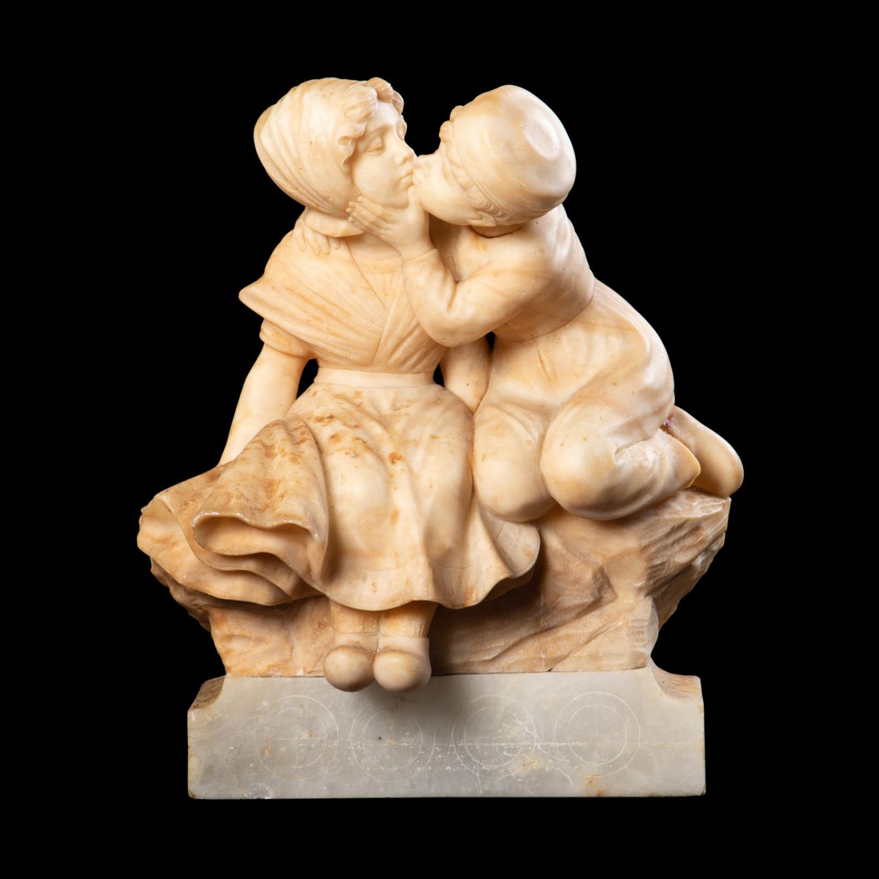 Appraisal: ITALIAN SCHOOL ALABASTER KISSING COUPLE Italian School Young Couple Kissing