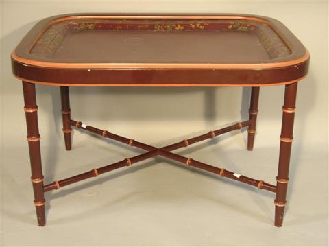 Appraisal: BURGUNDY PAINTED CHINOISERIE STYLE COFFEE TABLE th century the shaped