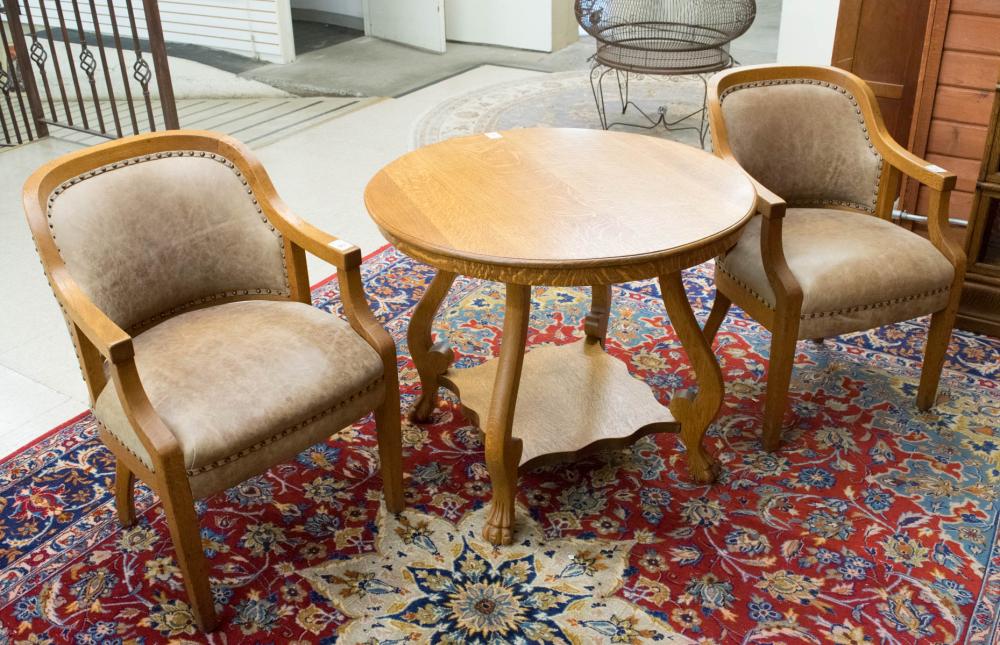 Appraisal: PAIR OAK ARMCHAIRS AND ROUND OAK LAMP TABLE American early