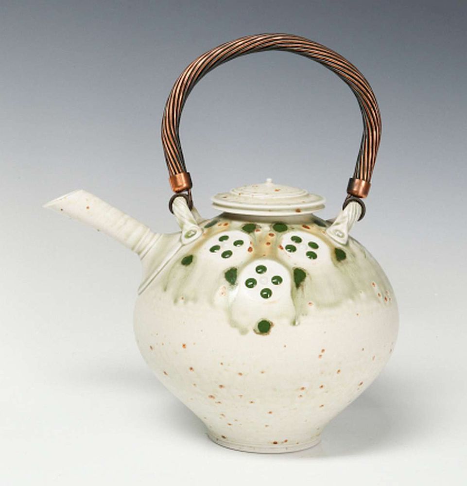 Appraisal: A TOM TURNER STUDIO PORCELAIN TEA POT WITH COPPER The