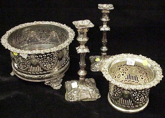 Appraisal: Two matching silverplate coaster racks medium and large lions head