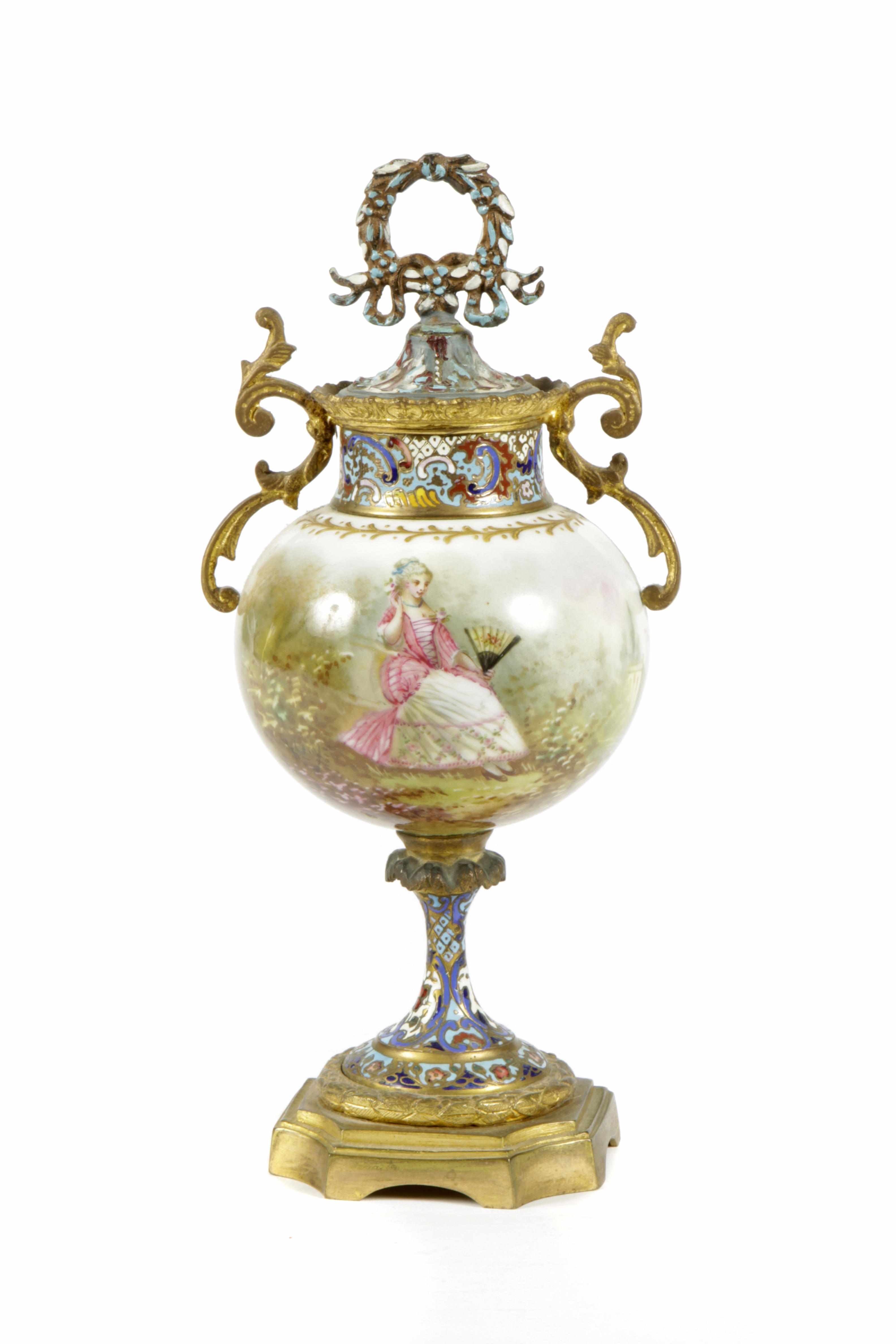 Appraisal: A French champleve gilt bronze mounted porcelain covered urn height