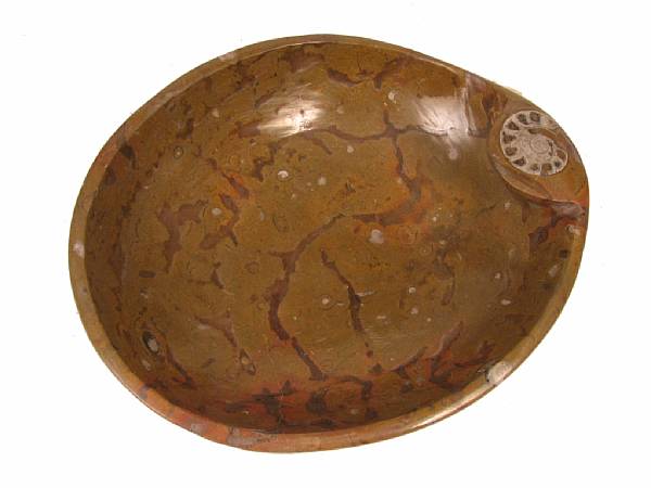 Appraisal: Carved Ammonite Bowl Morocco Fabricated from brown fossil-bearing marble this