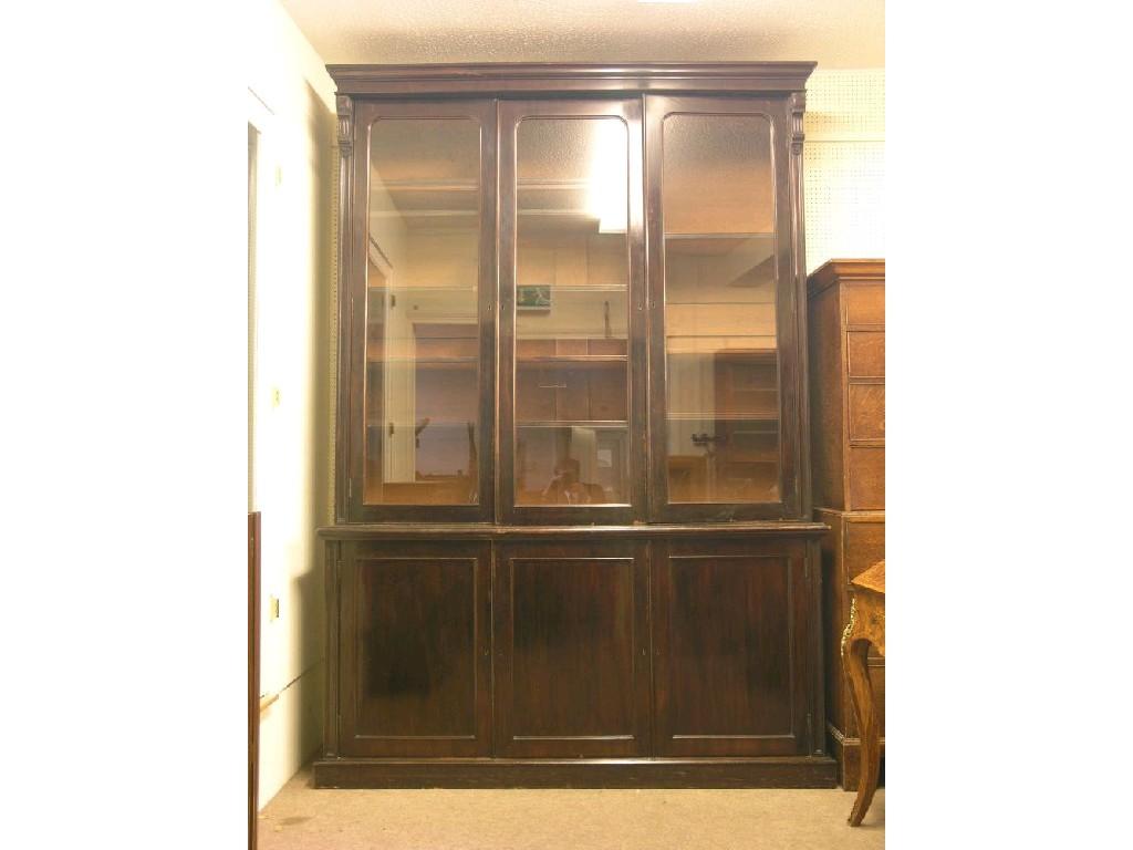 Appraisal: A large Victorian mahogany bookcase upper stage fitted with three