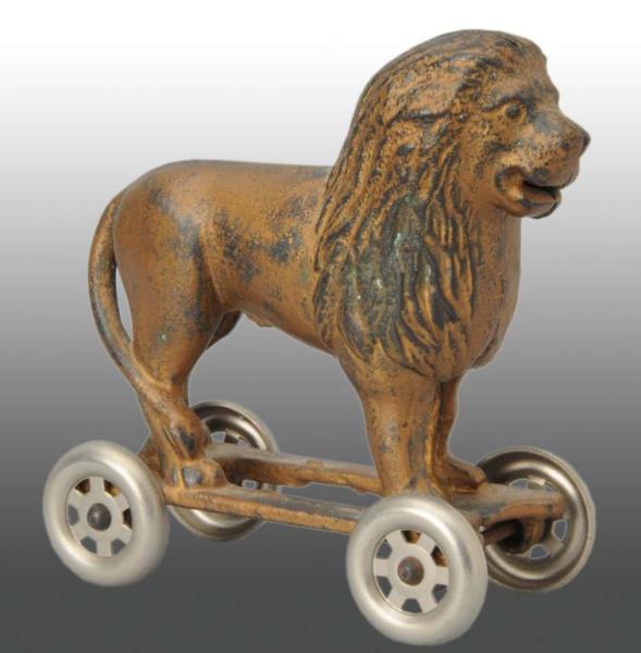 Appraisal: Cast Iron Lion on Wheels Still Bank Condition Excellent