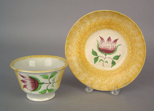 Appraisal: Yellow spatter cup and saucer with tulip th c