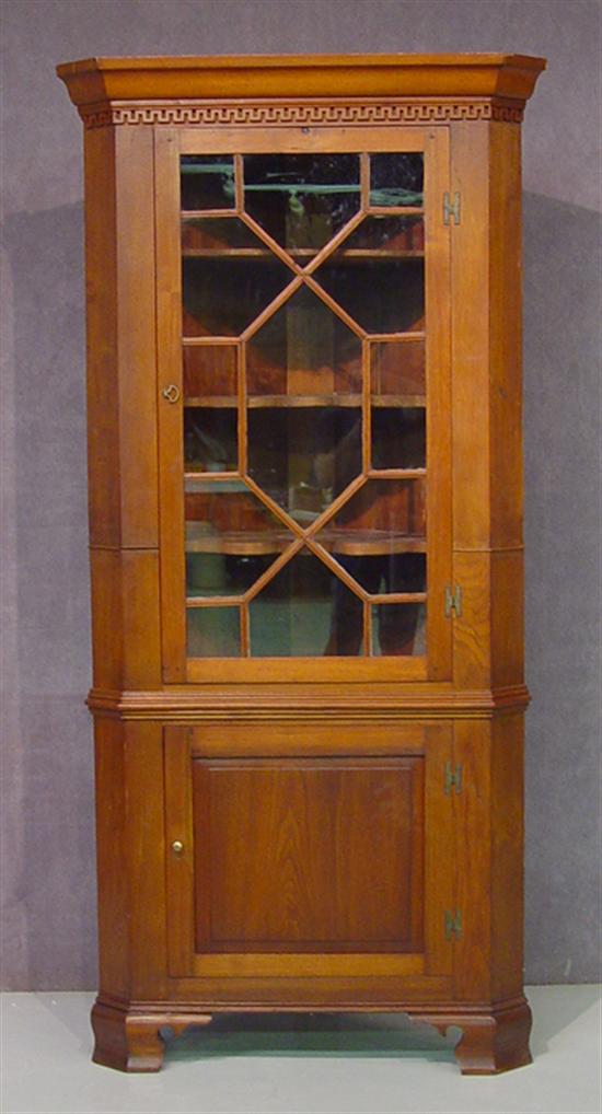 Appraisal: Diminutive Southern Walnut Corner Cupboard Molded cornice over Greek key