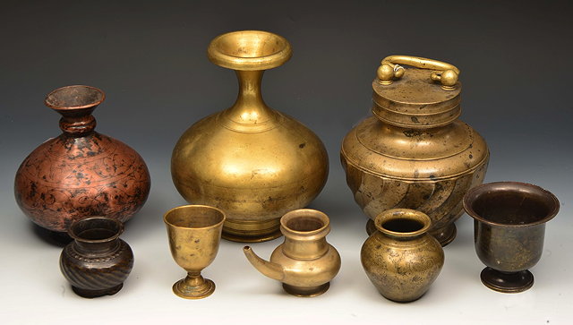 Appraisal: A COLLECTION OF EIGHT PIECES OF MIDDLE EASTERN OR INDIAN