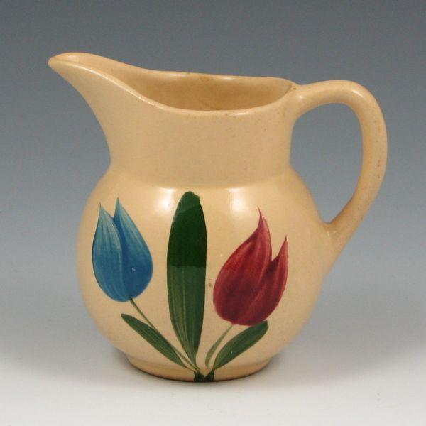 Appraisal: Watt Tulip creamer Marked USA Roughness to spout and repaired