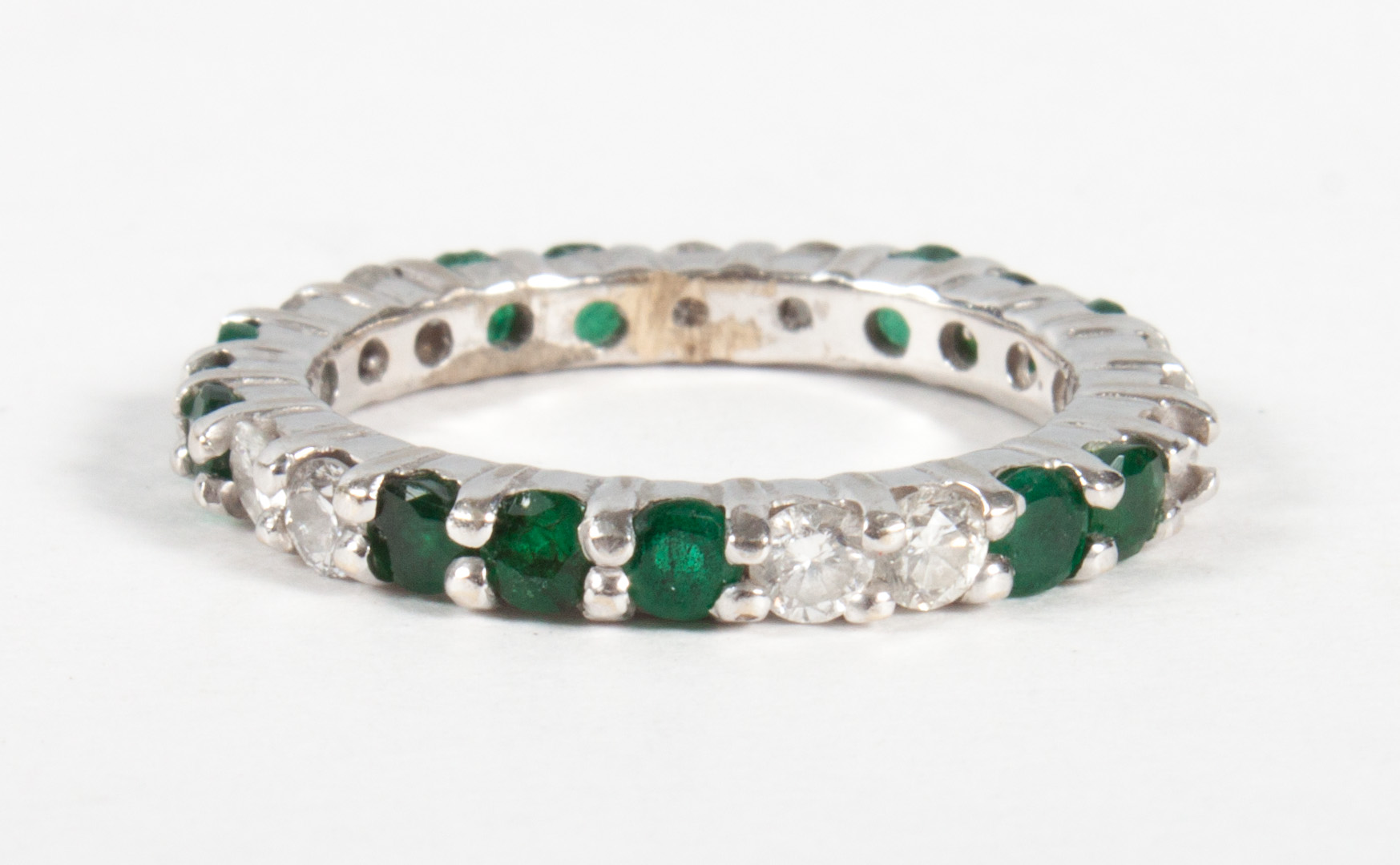 Appraisal: Lady's gold diamond emerald eternity band about mm wide size