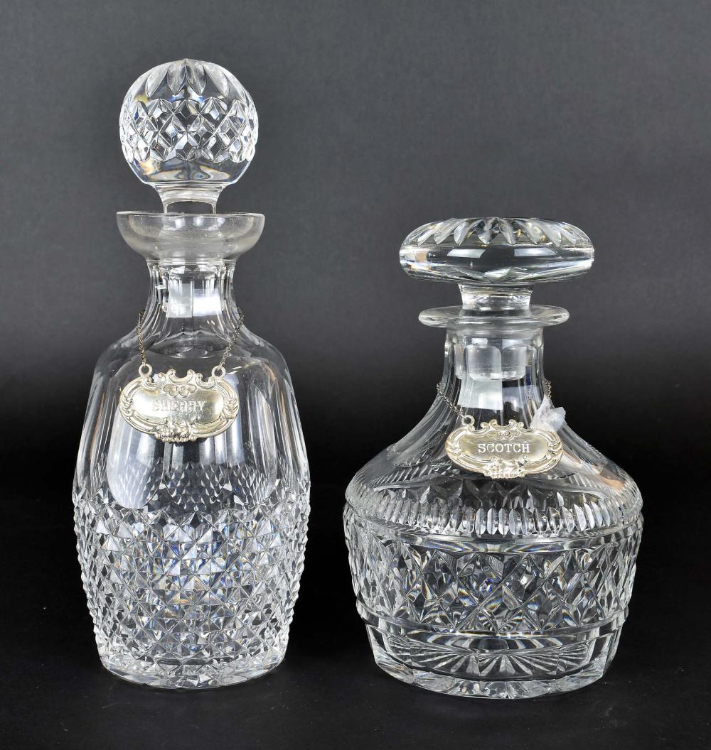 Appraisal: TWO CUT COLORLESS GLASS DECANTERS WITH STOPPERSUnsigned probably Waterford Both