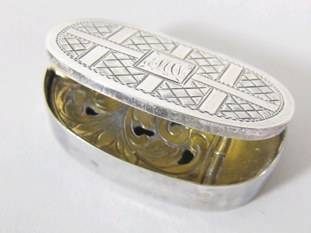 Appraisal: A George III oval Vinaigrette with trellis engraving and initials