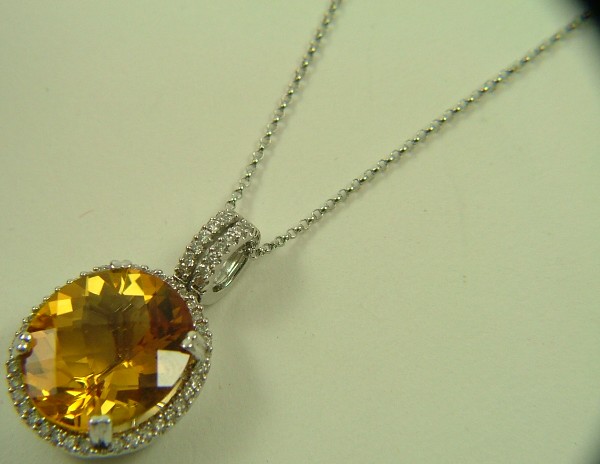 Appraisal: CITRINE AND DIAMOND PENDANT NECKLACE with appraisal The K white