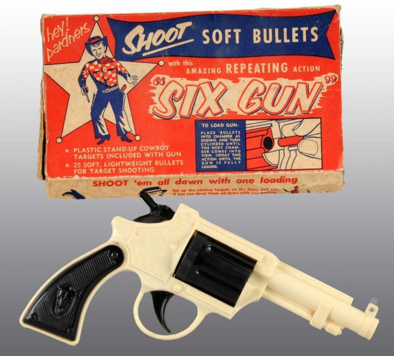 Appraisal: Plastic Toy Six-Gun Description Includes original box with overall wear