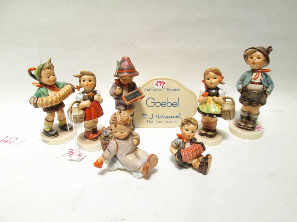 Appraisal: TWENTY-EIGHT HUMMEL PORCELAIN COLLECTIBLES Includes dolls On Holiday and Birthday