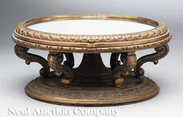 Appraisal: A Napoleon III Circular Mirrored Bronze Plateau the base having