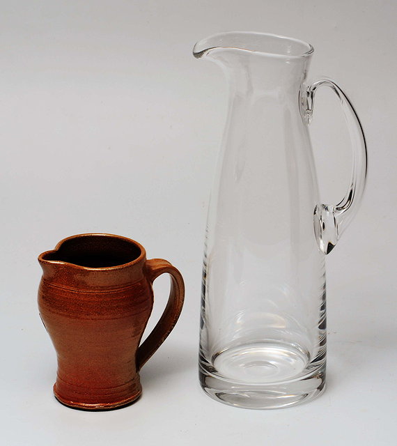 Appraisal: A CONTEMPORY GLASS JUG of inverted taper form cm tall